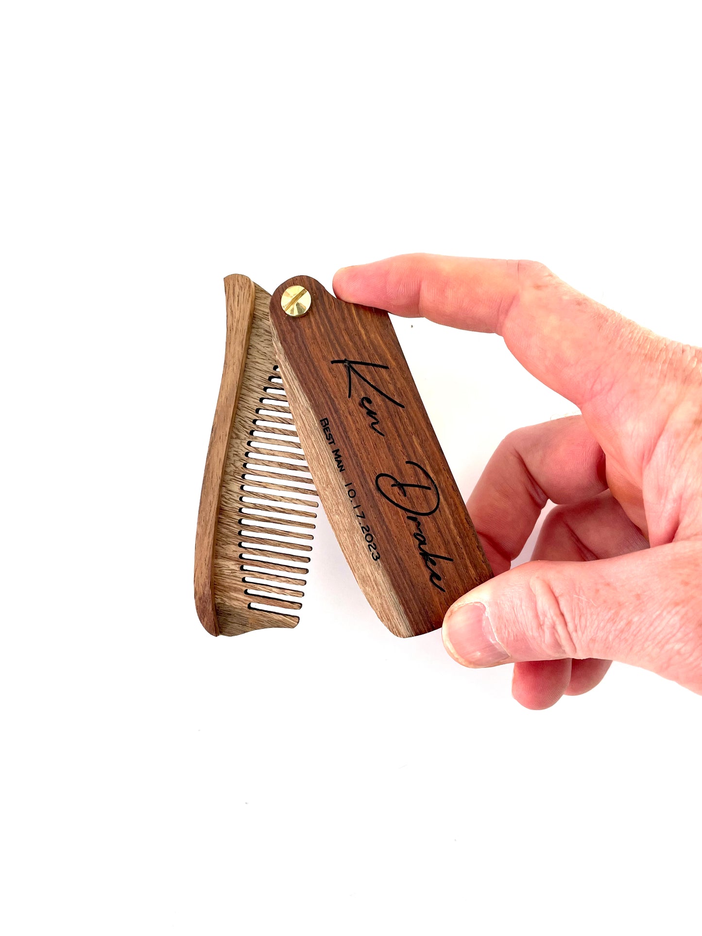 Made from eco friendly lightweight wood, your engraved wood beard comb makes for a unique gift for him.  Your personalized wood beard comb can be single or double sided engraved with letters, numbers or symbols.