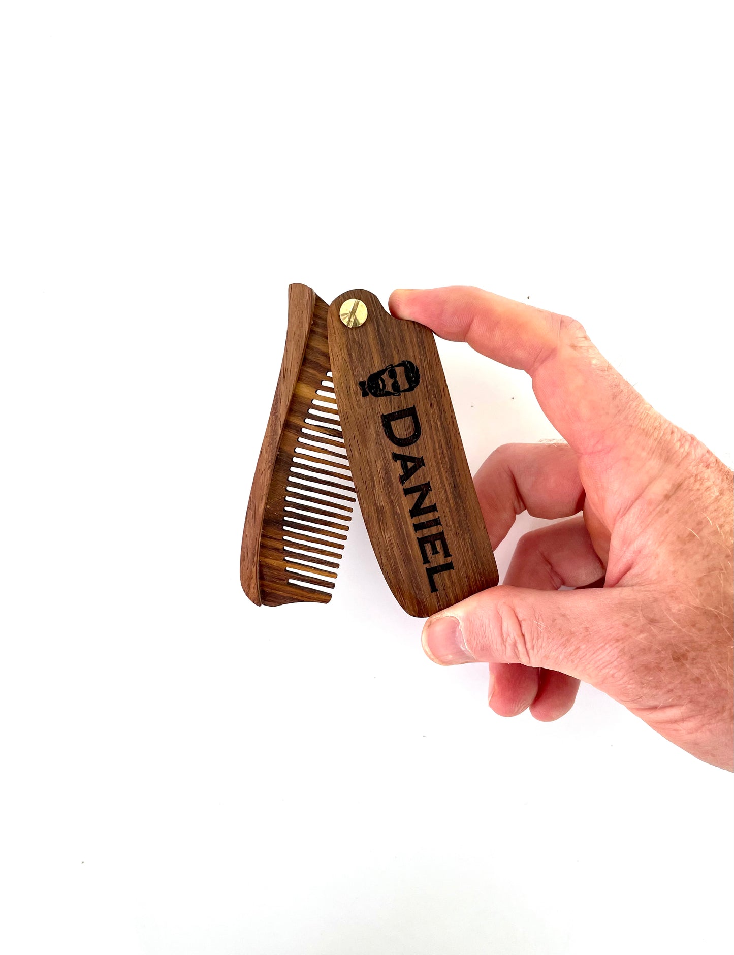 Made from eco friendly lightweight wood, your engraved wood beard comb makes for a unique gift for him.  Your personalized wood beard comb can be single or double sided engraved with letters, numbers or symbols.