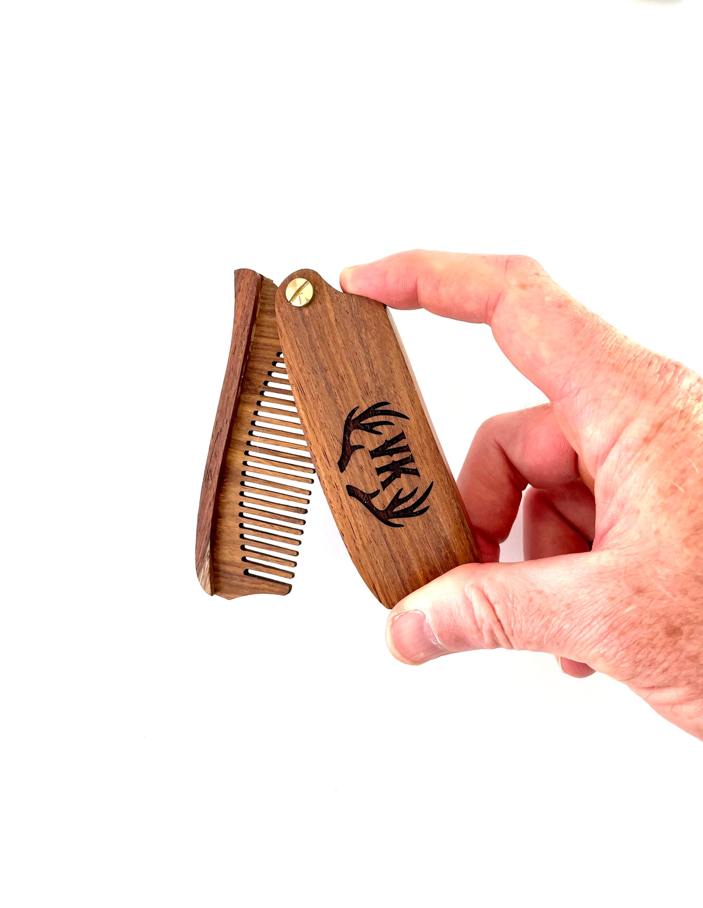 Made from eco friendly lightweight wood, your engraved wood beard comb makes for a unique gift for him.  Your personalized wood beard comb can be single or double sided engraved with letters, numbers or symbols.