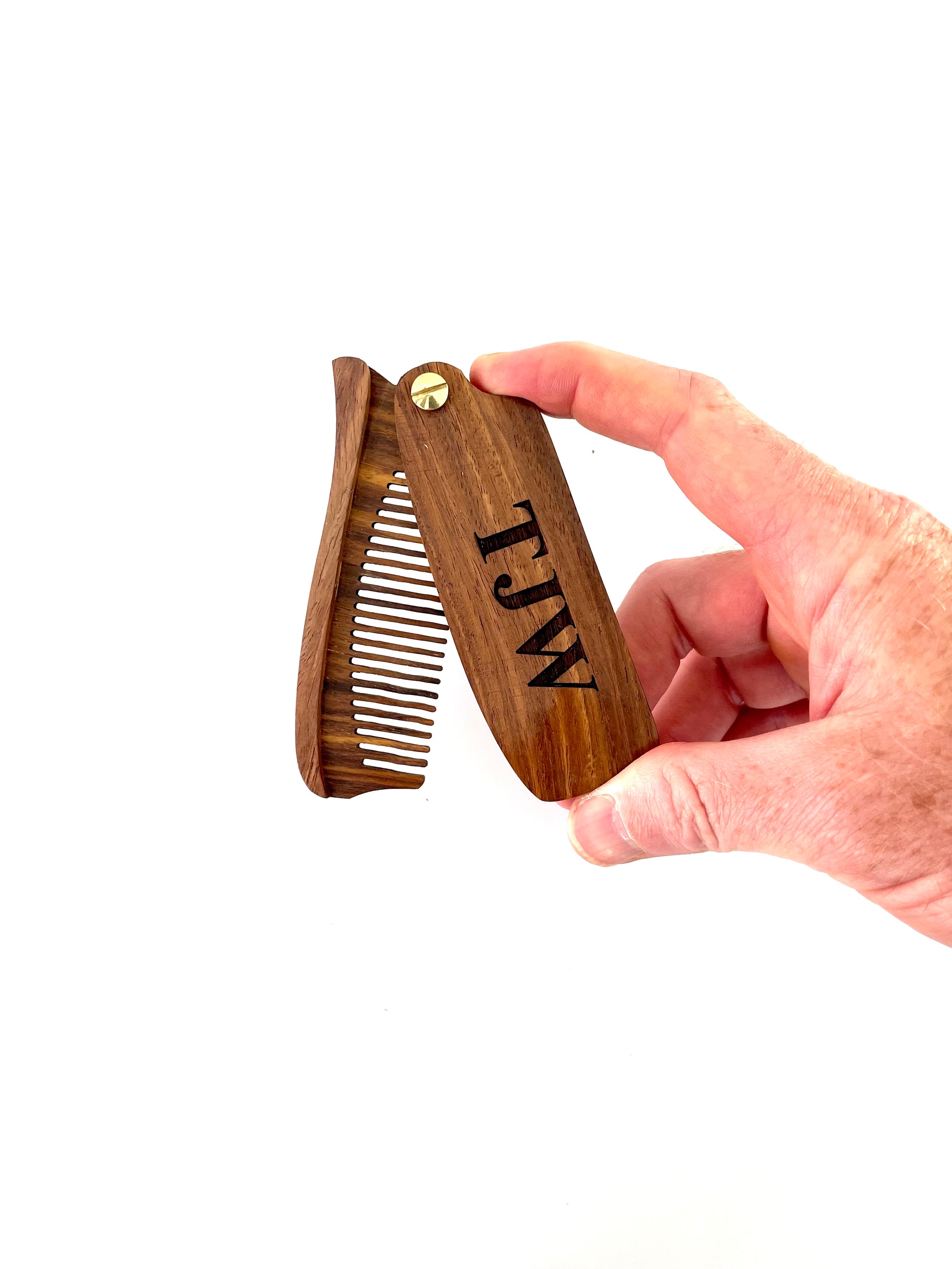 Made from eco friendly lightweight wood, your engraved wood beard comb makes for a unique gift for him.  Your personalized wood beard comb can be single or double sided engraved with letters, numbers or symbols.