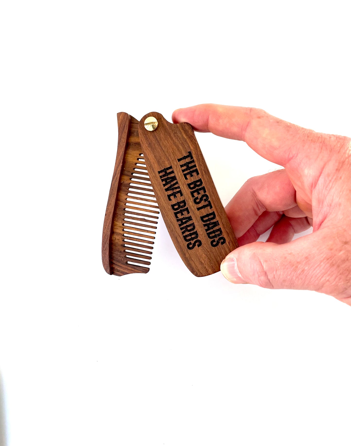 Made from eco friendly lightweight wood, your engraved wood beard comb makes for a unique gift for him.  Your personalized wood beard comb can be single or double sided engraved with letters, numbers or symbols.